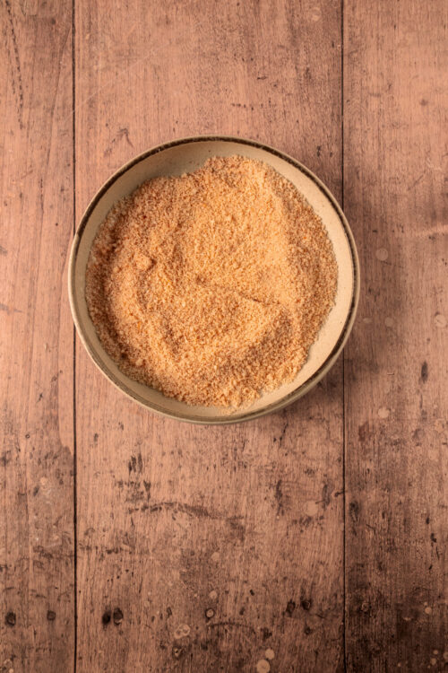 Combining dry ingredients for Keto Onion Rings.