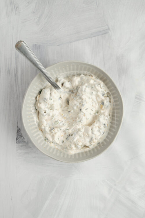 Mexican Tortilla Roll-Ups creamy filling in a gray bowl.