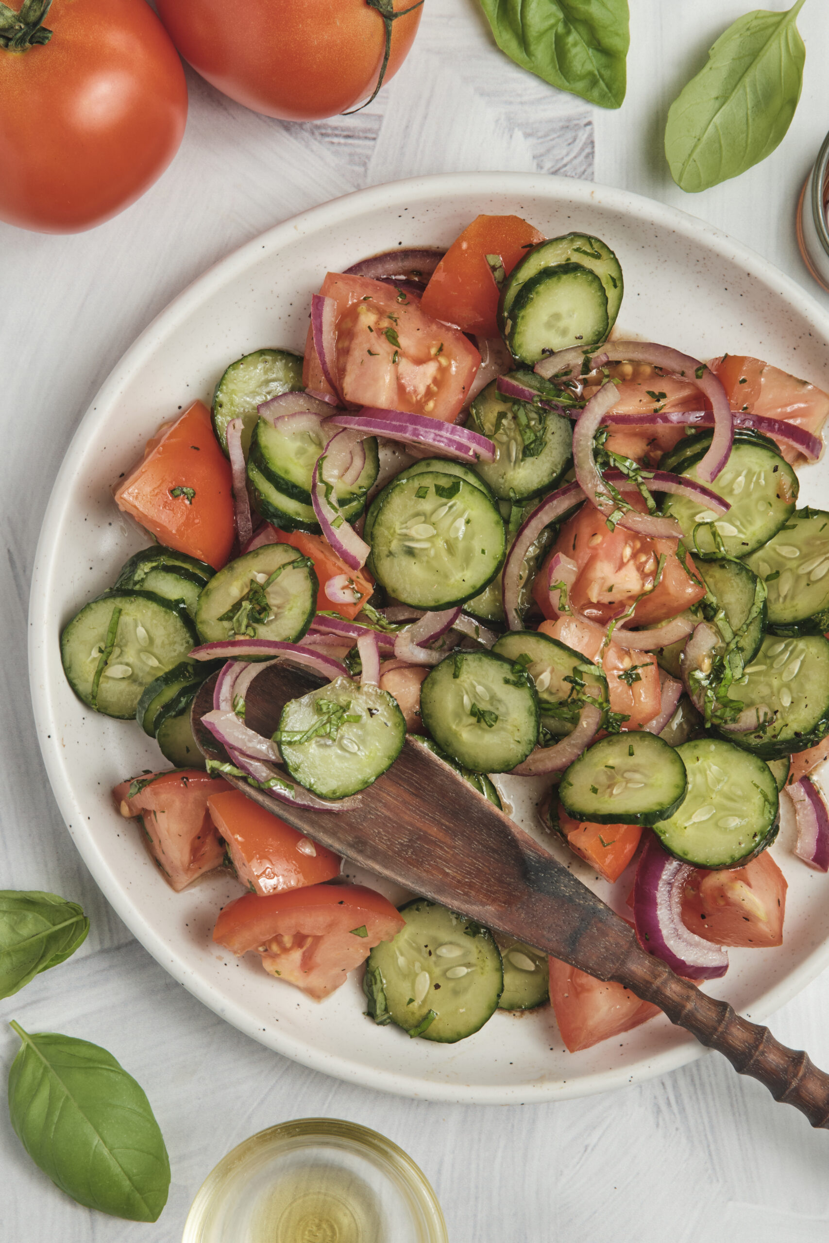 Cucumber Tomato Salad ona plate shot from above